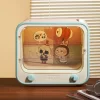 LOS MONSTRUOS Serie Atrápame si te gusto – Contenedor luminoso para televisor