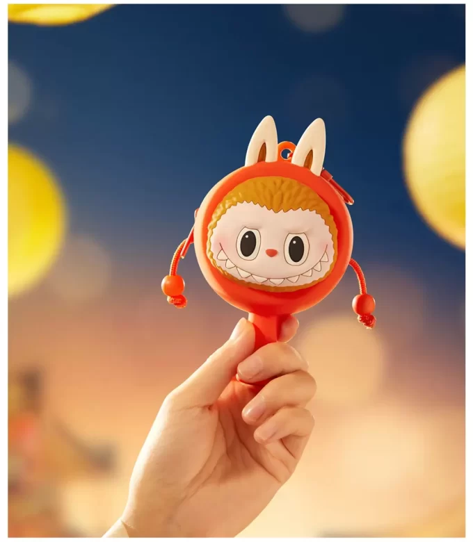 LOS MONSTRUOS Serie Divirtámonos Juntos – Estuche para Auriculares con Sonajero