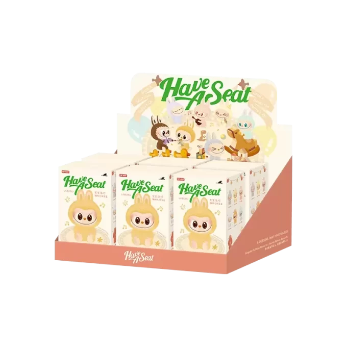 LOS MONSTRUOS – Siéntate en una caja sorpresa de peluche de vinilo LOS MONSTRUOS – Siéntate en una caja sorpresa de peluche de vinilo