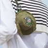 SERIE LOS MONSTRUOS CAEN EN LIBERTAD – Mini bolso con sombrero de pescador en caja SERIE LOS MONSTRUOS CAEN EN LIBERTAD – Mini bolso con sombrero de pescador en caja