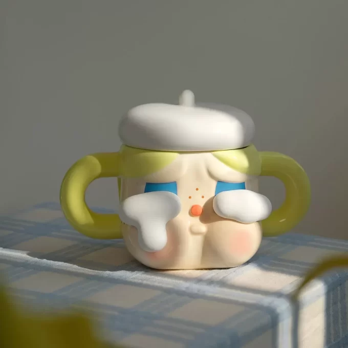 Taza de cerámica CRYBABY Sad Club Series (dorada)
